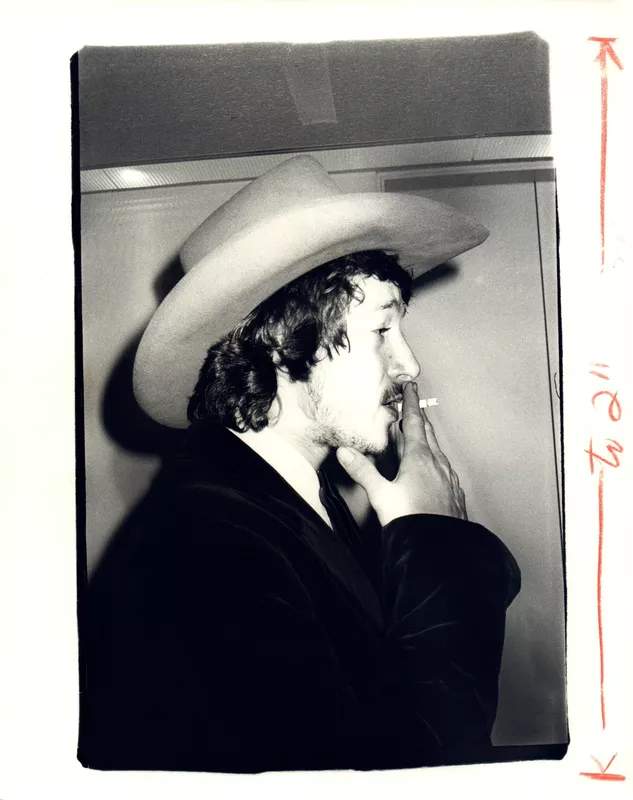 Man in a Cowboy Hat Smoking
