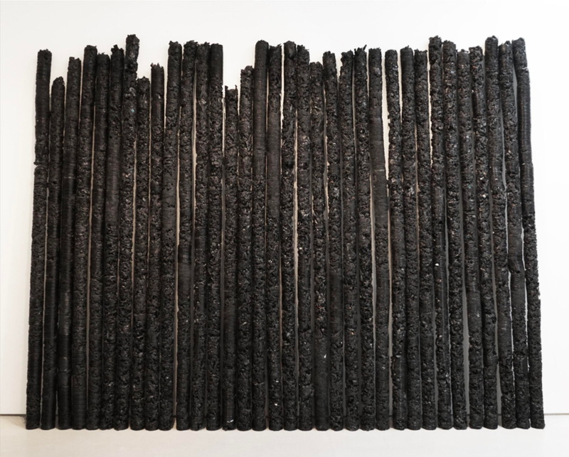 Untitled (thirty-four black poles) 